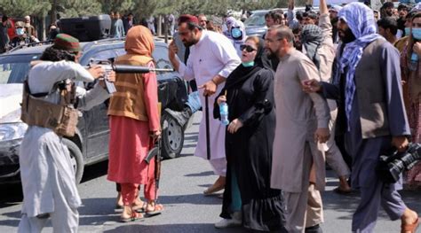 As women take to streets, Taliban says no protest without permission ...