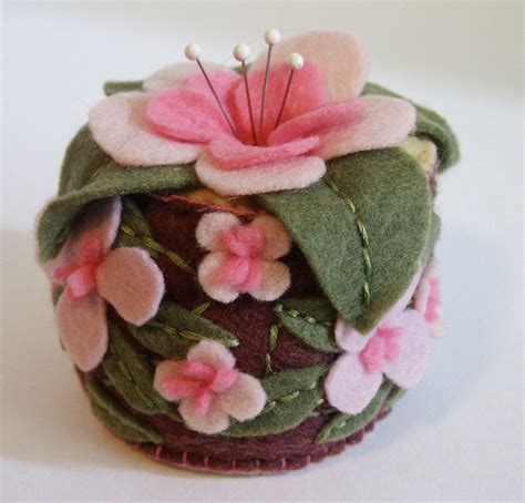 Pink flowers Pincushion | Jen Segrest | Flickr | Felt crafts, Pin ...