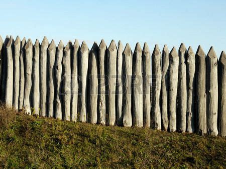 wooden palisade of the protective fence of an ancient fortress Stock ...