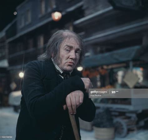 Albert Finney as Ebenezer Scrooge