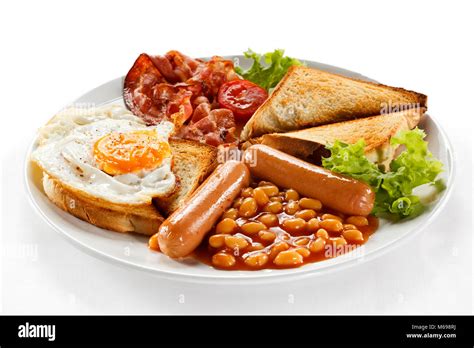 English breakfast - toast, egg, bacon and vegetables Stock Photo - Alamy