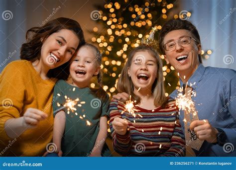 Family Celebrating New Year Stock Image - Image of holiday, home: 236256271