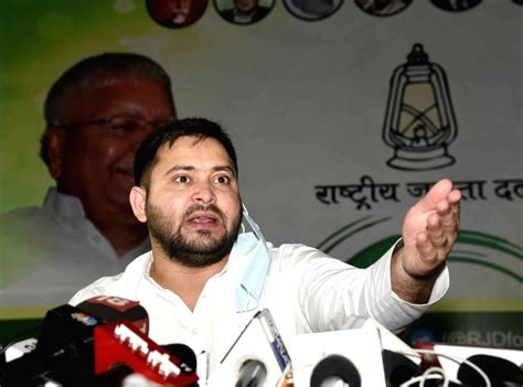 RJD leader Tejashwi Yadav addresses a press conference