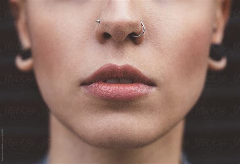 Close Up Of Young Woman With Nose Piercings | Stocksy United