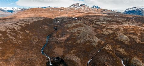 Aerial view of the Svartifoss waterfall surrounded by basalt columns 7918683 Stock Photo at Vecteezy