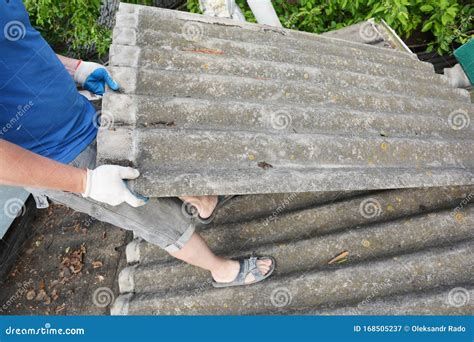 Asbestos Removal Roofer Roof Works. House with Old, Danger Asbestos Roof Tiles Repair and ...