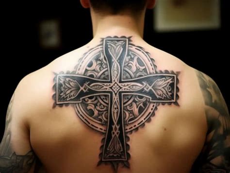 Upside Down Cross Tattoo Meaning & Symbolism (Humility)