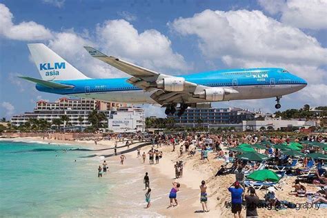 A plane landing on St. Maarten. (With images) | Beaches in the world, Saint martin island, St martin