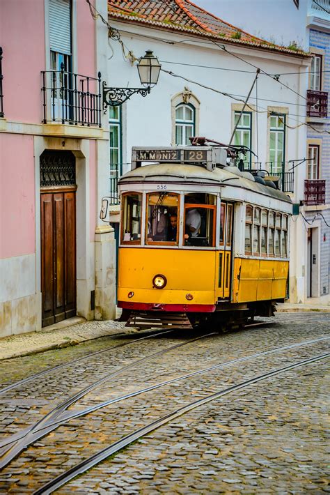 Street Tram #28 in Alfama - Lisbon Portugal | Lisbon portugal, Portugal ...