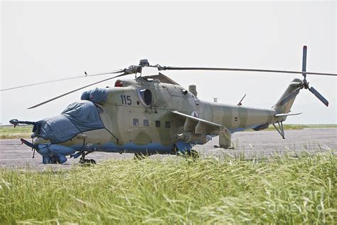 An Mi-35 Attack Helicopter At Kunduz Photograph by Terry Moore - Fine Art America