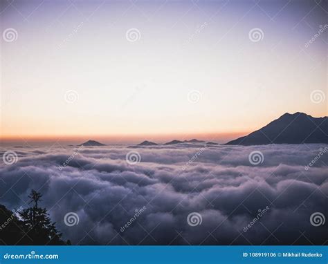 Mountain Above the Clouds, Sunset Time Stock Photo - Image of dusk ...