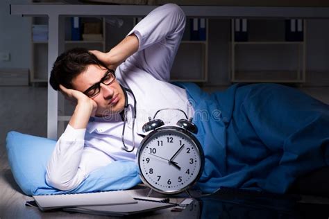 The Doctor Working Night Shift in Hospital after Long Hours Stock Image - Image of management ...