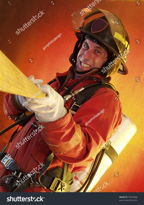 Firefighter In Action. Stock Photo 76670686 : Shutterstock