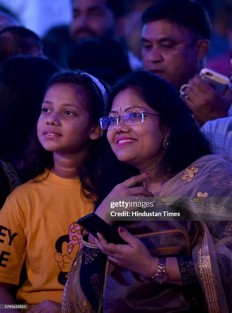 People are seen during Durga Puja festival at Kali bari, Sector 26 on ...