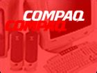 Compaq logs 3Q loss, lowers 4Q target - Oct. 23, 2001