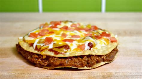 Why You Might See Taco Bell's Mexican Pizza On The Menu Again