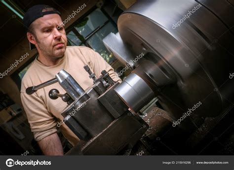 Metal Worker Shaping Metal Lathe Stock Photo by ©tcsaba 215916296