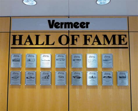 F4 Recognition Wall with Etched Plaques | Pella Engraving & Sign Company