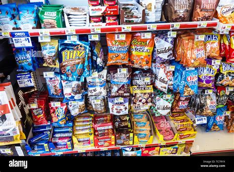 Miami Florida,candy snack junk food sale display,Reese's Hershey's Chex Mix,chocolate,visitors ...