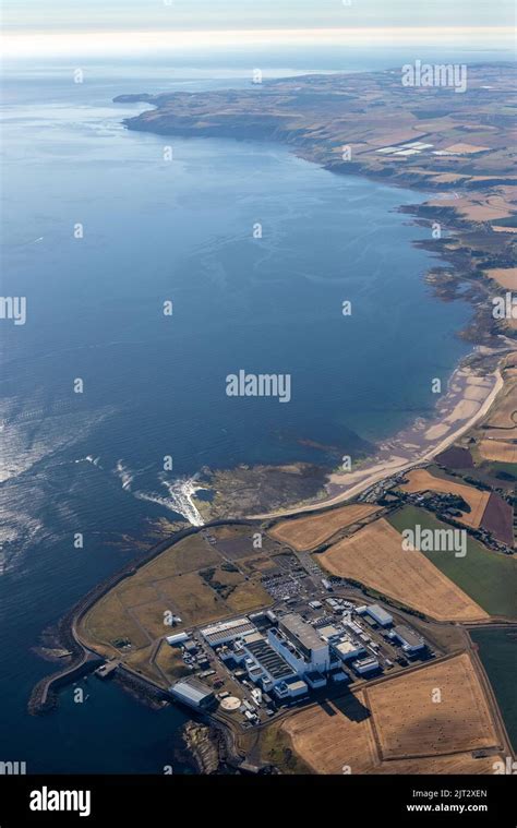 Aerial view of Torness Nuclear Power Station on the east coast of Scotland 4 miles south-east of ...