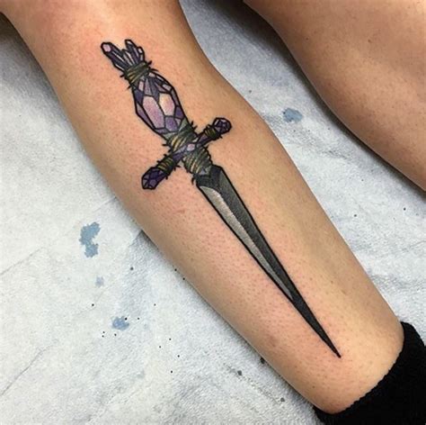 50 Amazing Sword, Dagger, and Knife Tattoo Designs - TattooBlend