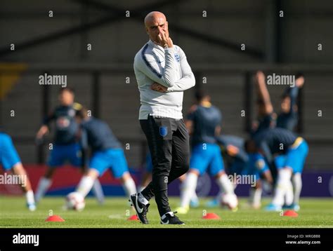 England coach during the Under 18 International friendly match between ...