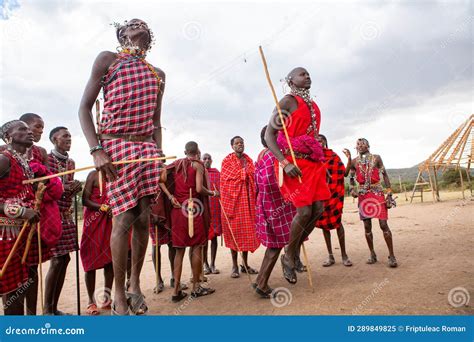 Masai in Traditional Colorful Clothing Showing Maasai Jumping Dance at ...