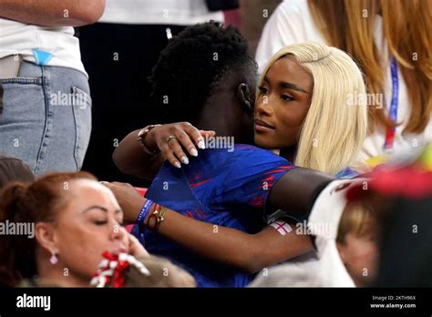 England's Bukayo Saka with his girlfriend Tolami Benson during the FIFA ...