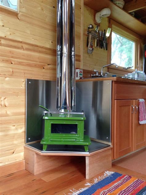 Jenn’s Tiny House | Tiny House Swoon | Tiny wood stove, Tiny house on wheels, Small wood stove