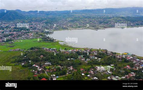 Urban landscape of Marawi city with houses and streets on the shore of ...