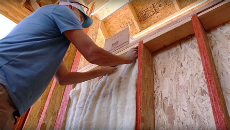 Havelock Wool insulation being installed - Construction Specifier