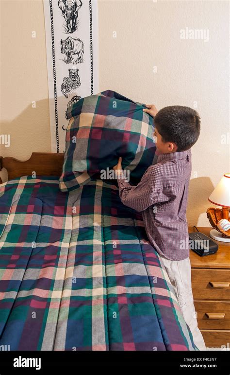 Tidying up bedroom hi-res stock photography and images - Alamy