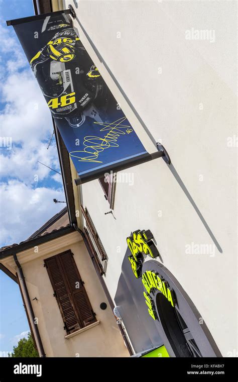 Fans queue at the VR46 merchandise and fan shop. Tavullia, Italy. Hometown of Valentino Rossi ...