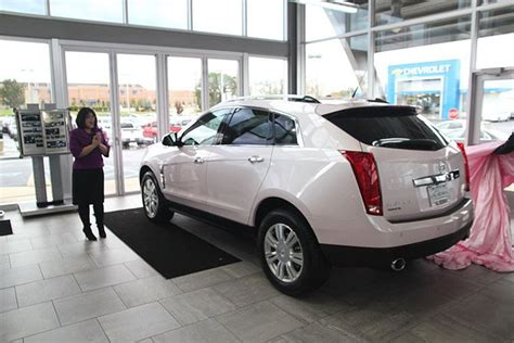 Al Serra Cadillac in Grand Blanc delivers Mary Kay pink Cadillac to local sales consultant ...