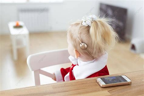 Deaf Girl With Cochlear Implant In Living Room For Advertising Photo Background And Picture For ...