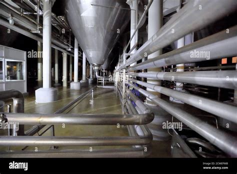 Equipment for production of beer in factory shops Stock Photo - Alamy