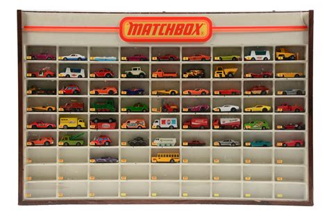 Lot Detail - VINTAGE MATCHBOX DISPLAY CASE W/ 55 VINTAGE MATCHBOX CARS.