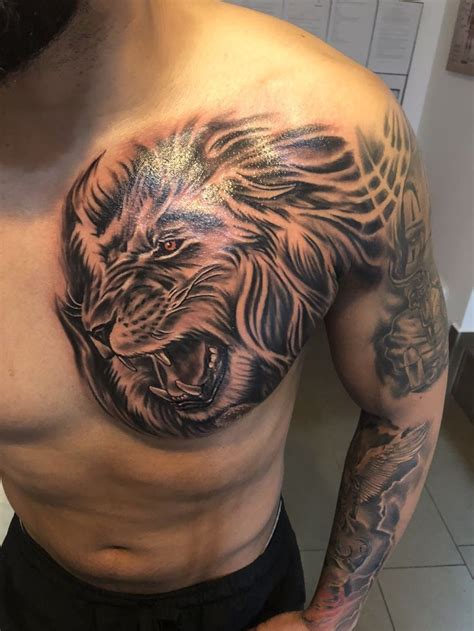 Lion Chest Tattoo | Cool chest tattoos, Lion chest tattoo, Chest tattoo men