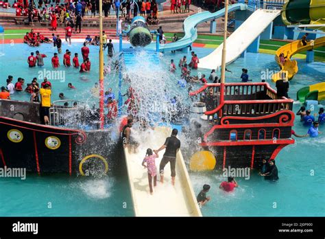 Peoples enjoy a ride at Dream Holiday Park in Narsingdi District outskirts of Dhaka, Bangladesh ...