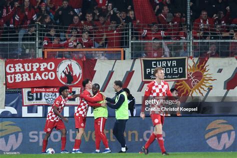 Players of FSV Mainz 05 celebrate the own goal scored by Keven... News ...