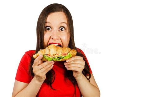 Young Woman Eats Croissant with Ham and Cheese, Isolated on White ...