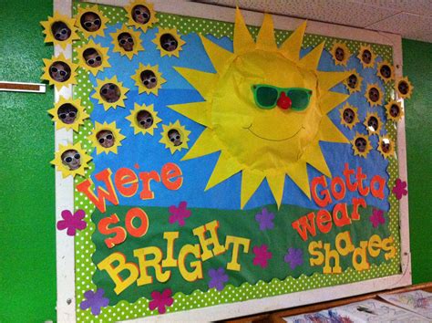 a bulletin board with sun and stars on it