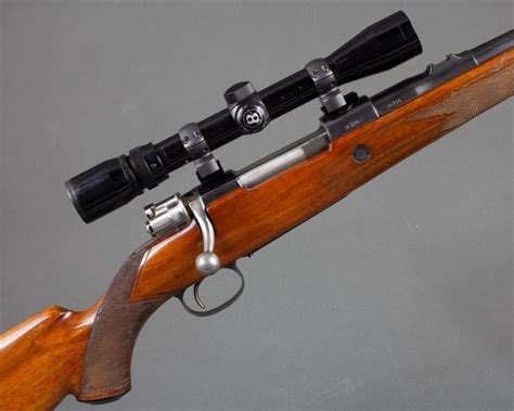 Lot - FN, Mauser Deluxe bolt action rifle with scope,