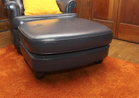 Navy Blue Leather Chair and Ottoman | EBTH