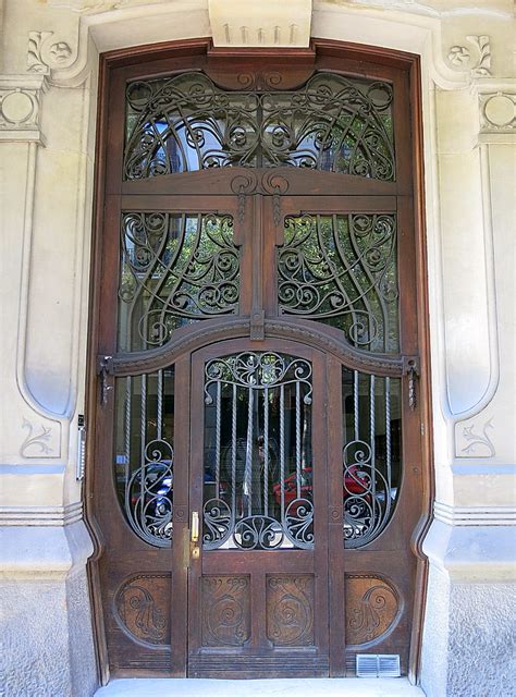 Carved wood, iron and glass door, Barcelona | Spencer Means | Flickr