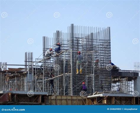 Construction Workers Install Reinforcement Bars at the Construction ...