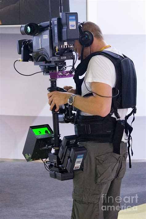 Camera Operator With Steadicam Photograph by Mark Williamson/science Photo Library - Fine Art ...