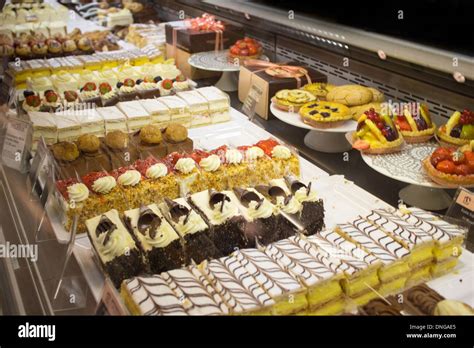 Patisserie Valerie cakes slices and patisseries on display Stock Photo ...