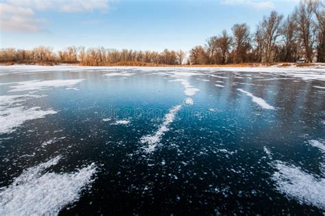 Frozen lake with clear ice stock image. Image of iceland - 140981383