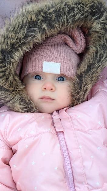 Premium Photo | Cute baby girl in winter clothes